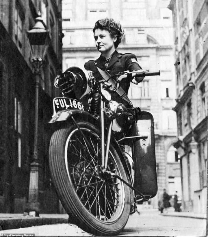 Meg Moorat (a.k.a. Miss Mercury) was a WVS motorcycle messenger in London during the war. Here she’s riding a Triumph Twin in the streets of Whitehall (1941).png