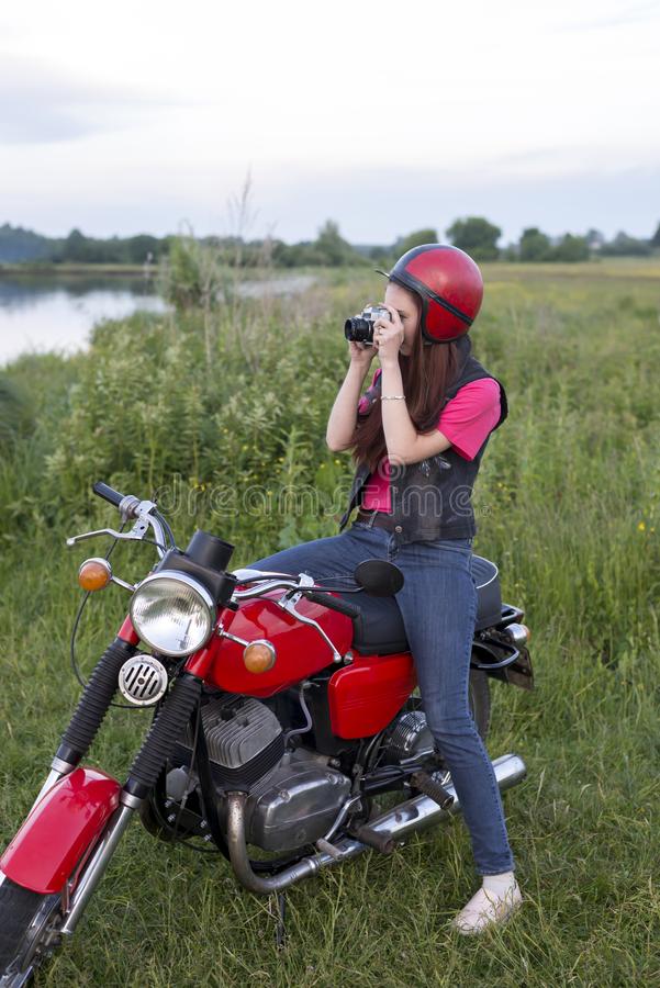 girl-retro-helmet-sitting-red-vintage-motorcycle-camera-girl-retro-helmet-sitting-vintage-motorcycle-119496356.jpg