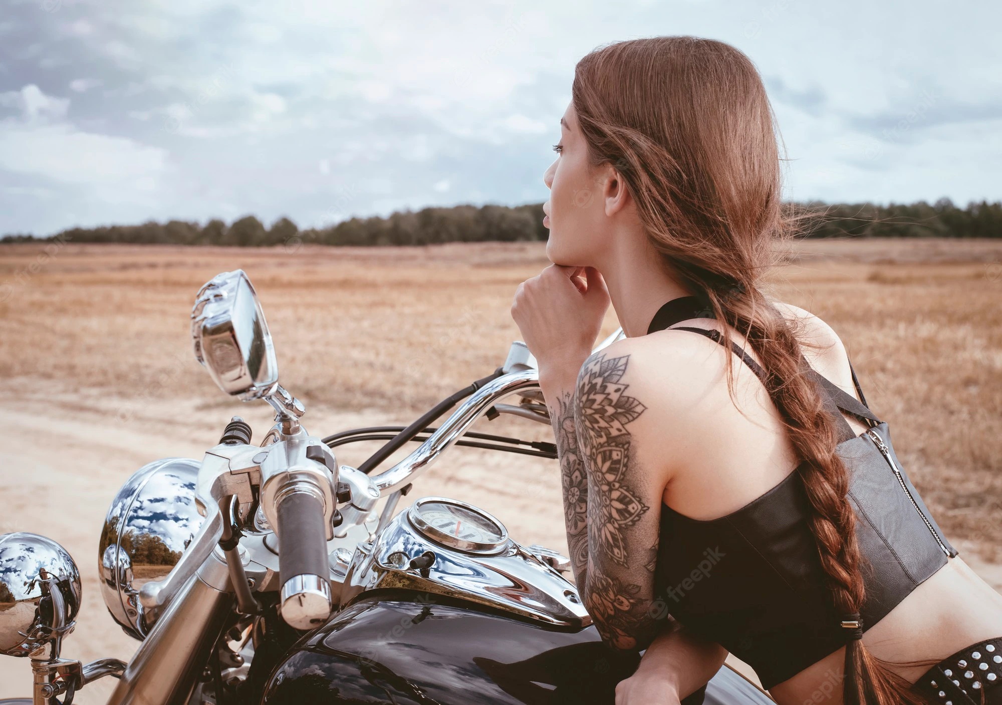young-sexy-girl-posing-motorcycle-sunset-motor-sport-concept-mixed-media_392761-2480.jpg