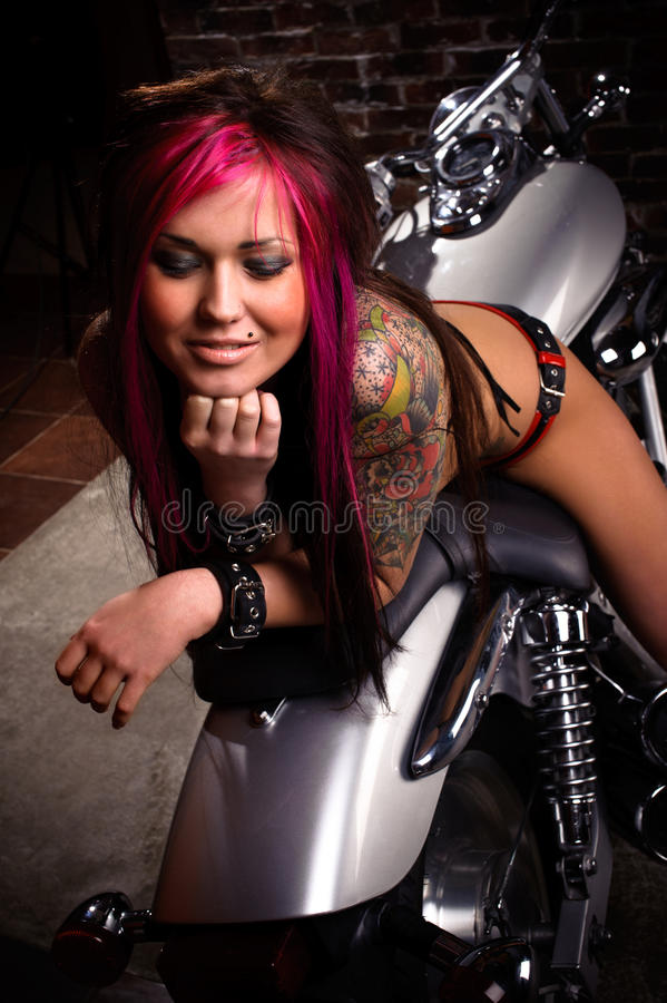 attractive-girl-sitting-chopper-18368913.jpg