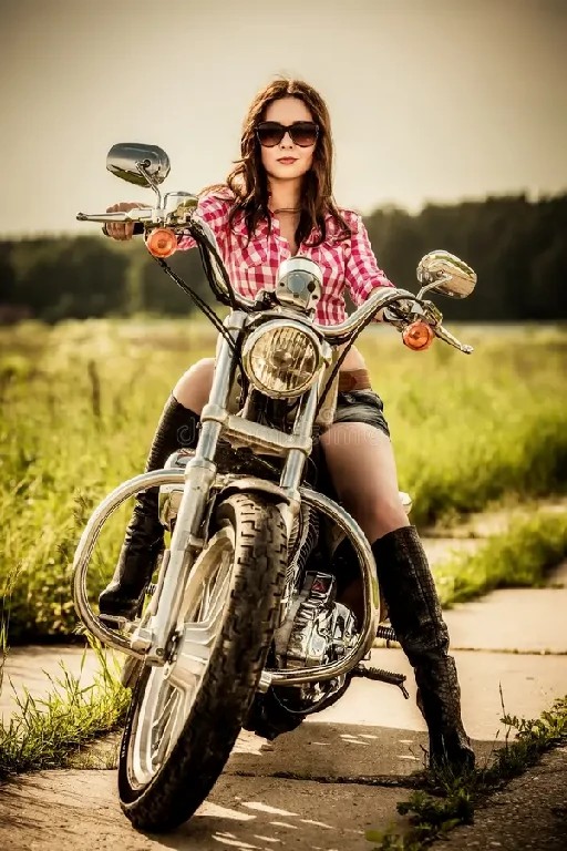 biker-girl-sitting-motorcycle-sunglasses-31500168~1.jpg