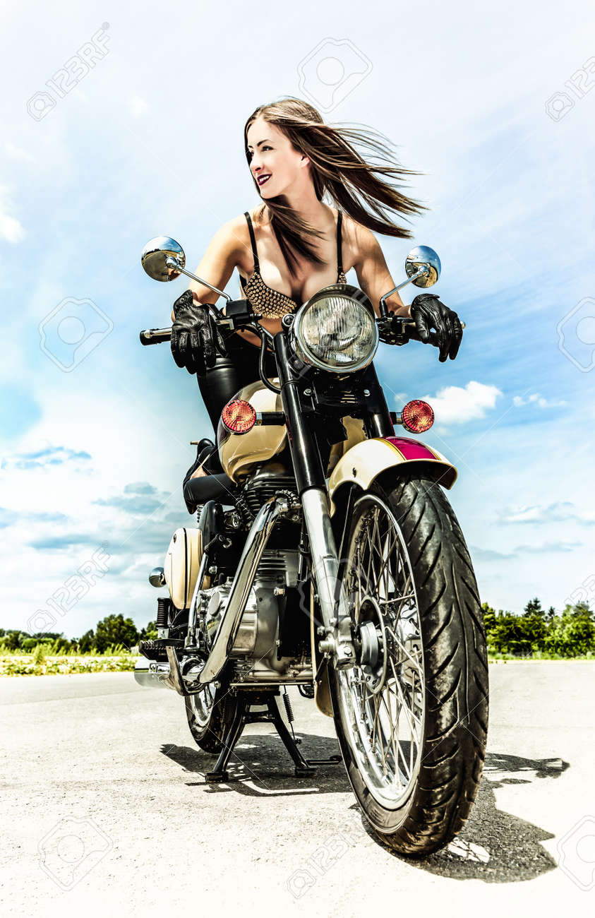 64029180-fashion-model-biker-girl-on-a-motorcycle.jpg