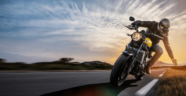 man-on-motorbike-road-riding-600nw-1495980317.jpg